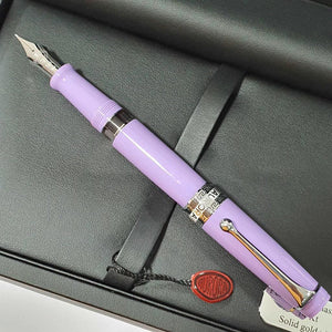 Lavender fountain pen with silver trim and nib on a black leather case