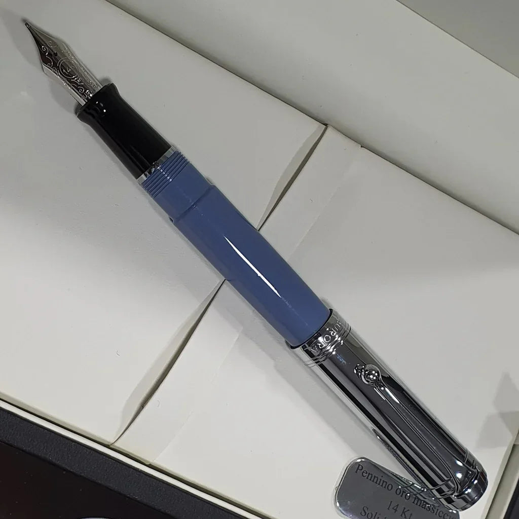 Blue and silver luxury fountain pen with engraved nib in presentation box