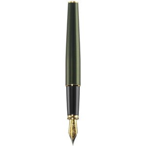 Green and gold fountain pen with black grip and gold nib on white background