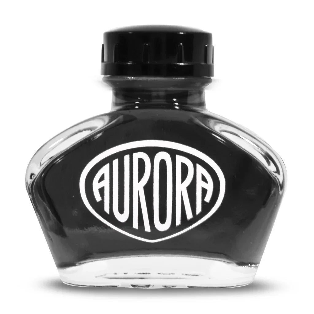 Aurora black fountain pen ink bottle with bold white label on clear glass